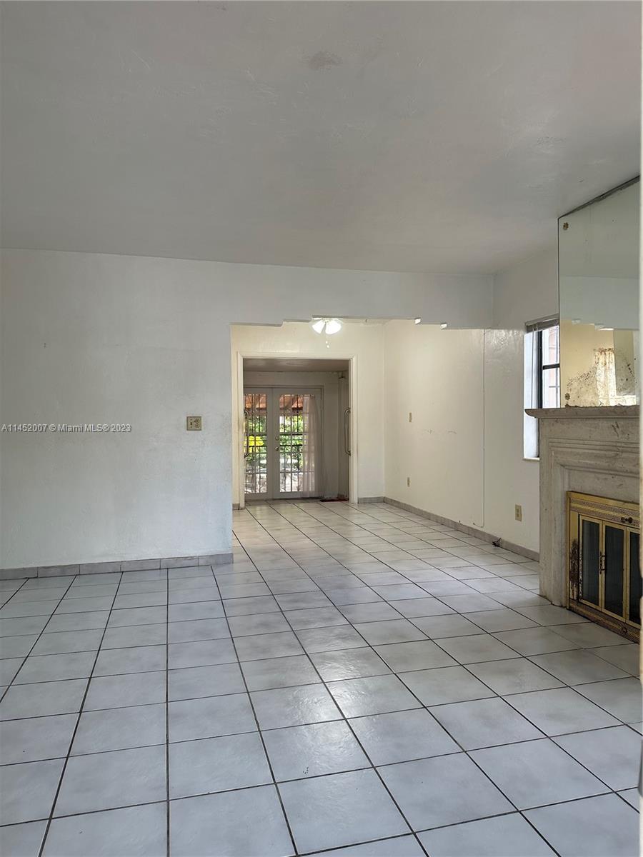 West Flagler Miami, FL 33135 - Photo 12 of 46 a view of a livingroom with a fireplace