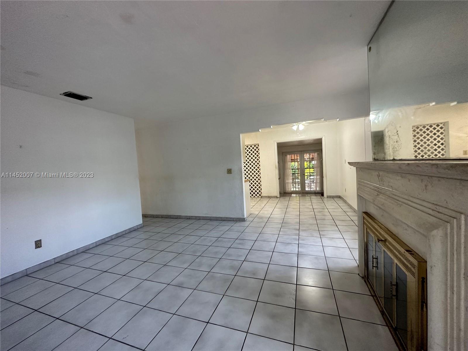 West Flagler Miami, FL 33135 - Photo 16 of 46 a view of an empty room and window