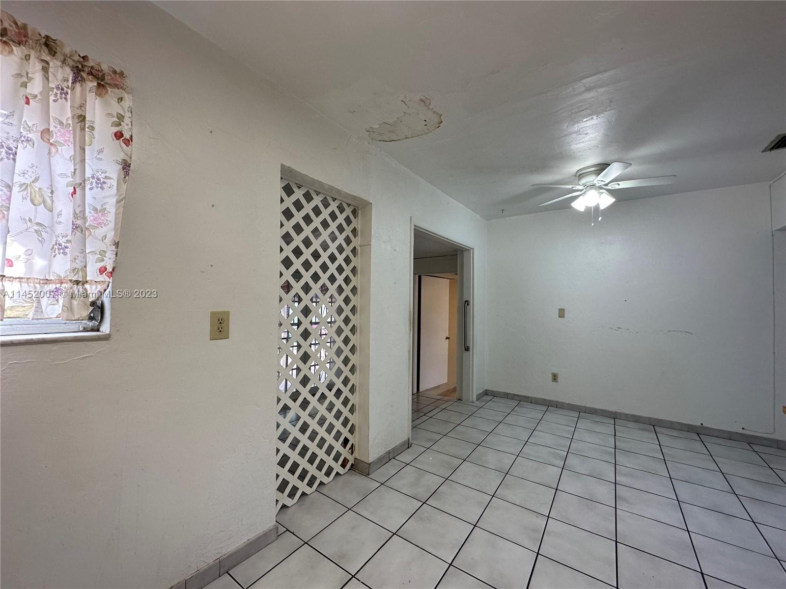 West Flagler Miami, FL 33135 - Photo 20 of 46 a view of an empty room with a window