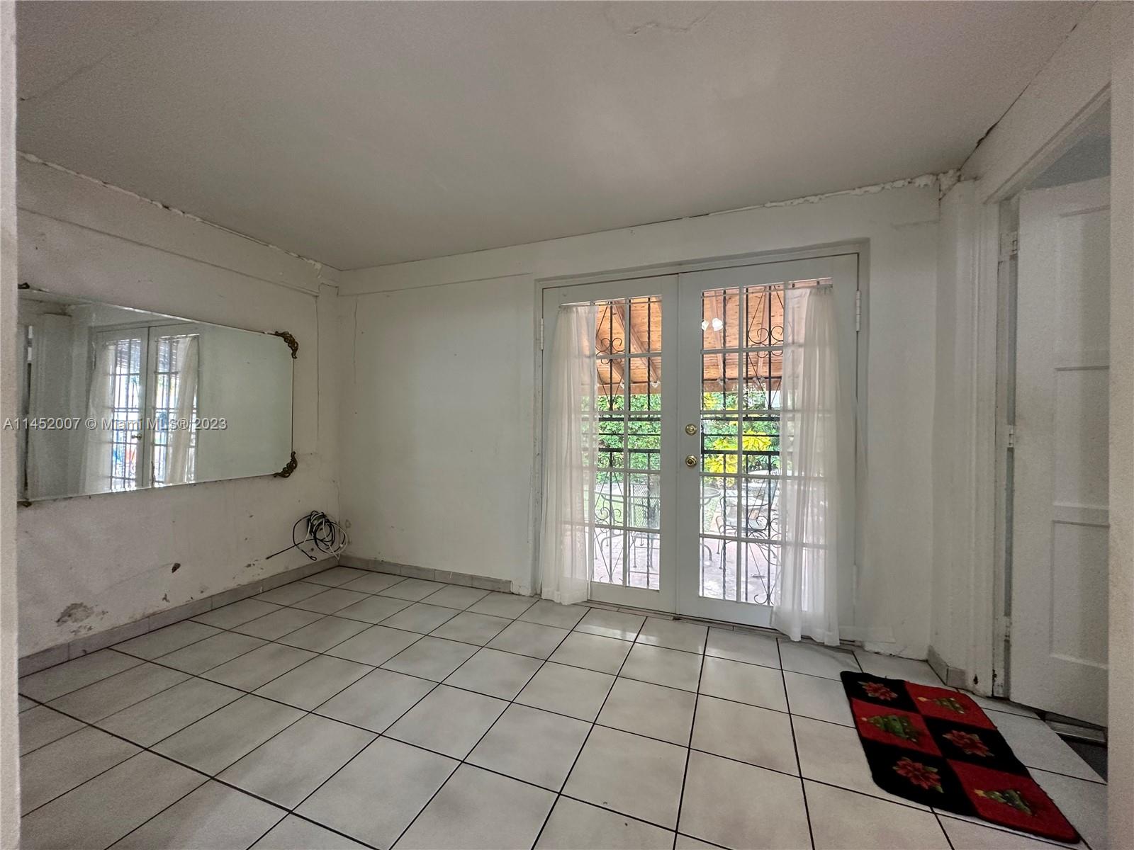 West Flagler Miami, FL 33135 - Photo 21 of 46 a view of an empty room and window