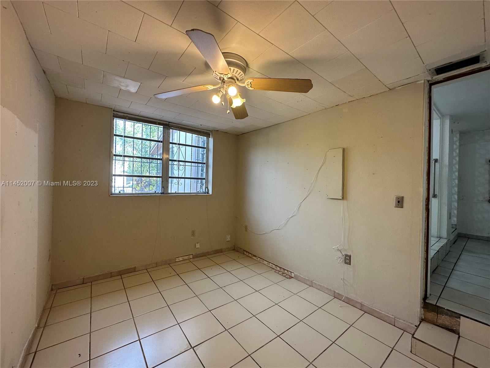 West Flagler Miami, FL 33135 - Photo 29 of 46 a view of an empty room with a window