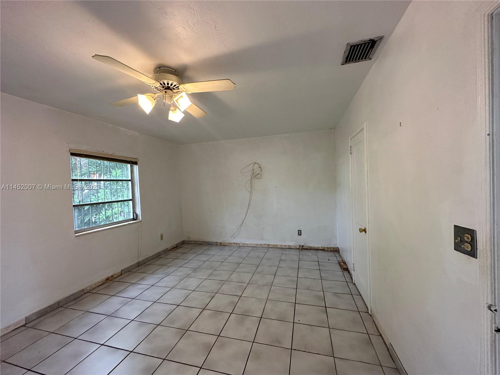 West Flagler Miami, FL 33135 - Photo 31 of 46 a view of an empty room with a window