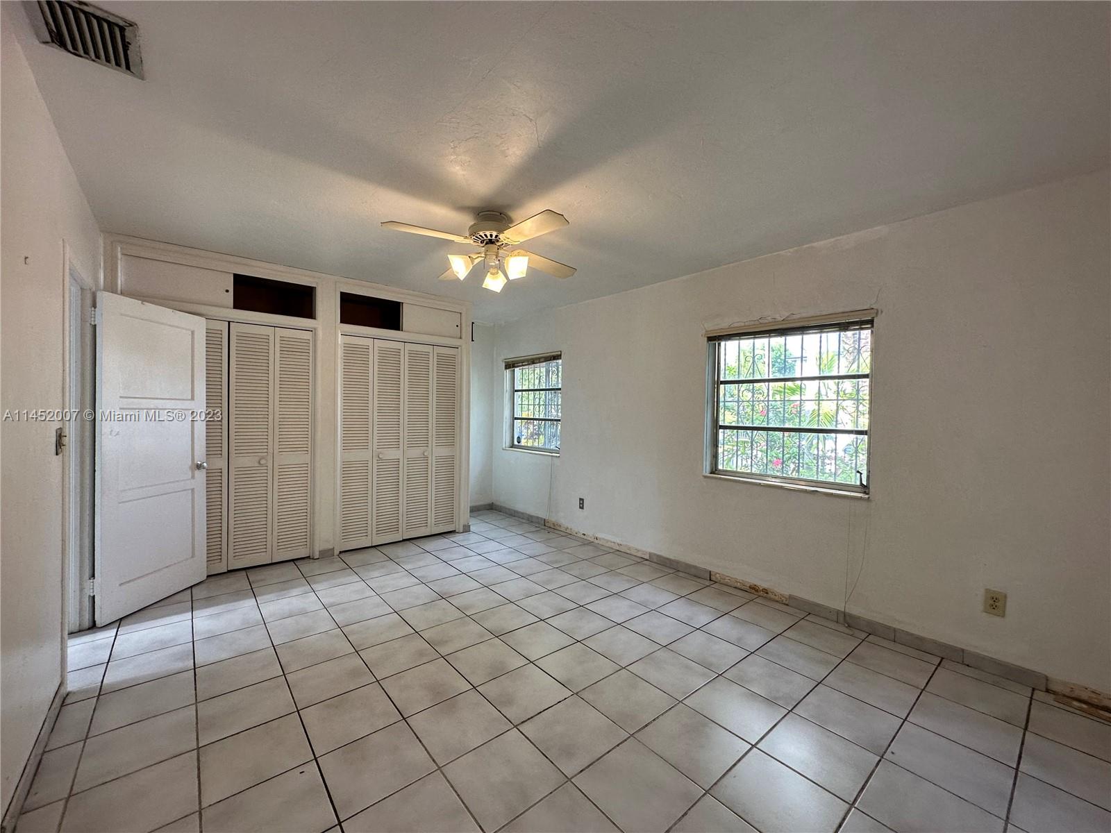 West Flagler Miami, FL 33135 - Photo 32 of 46 en empty room with windows