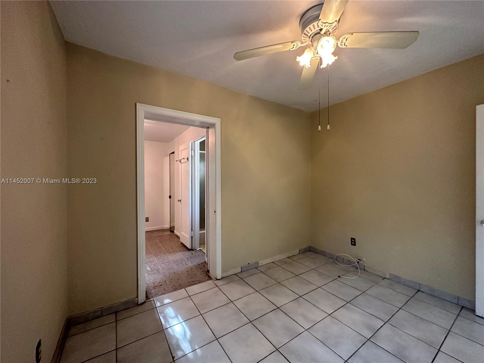 West Flagler Miami, FL 33135 - Photo 40 of 46 a view of a chandelier fan and entryway