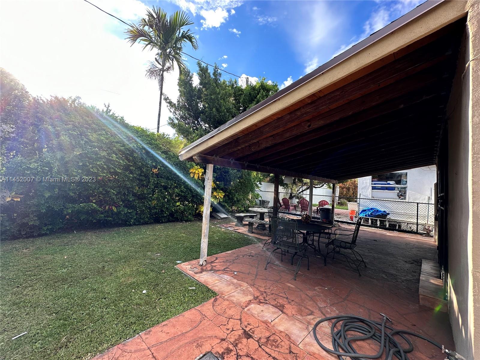 West Flagler Miami, FL 33135 - Photo 7 of 46 a view of patio with chairs and a table