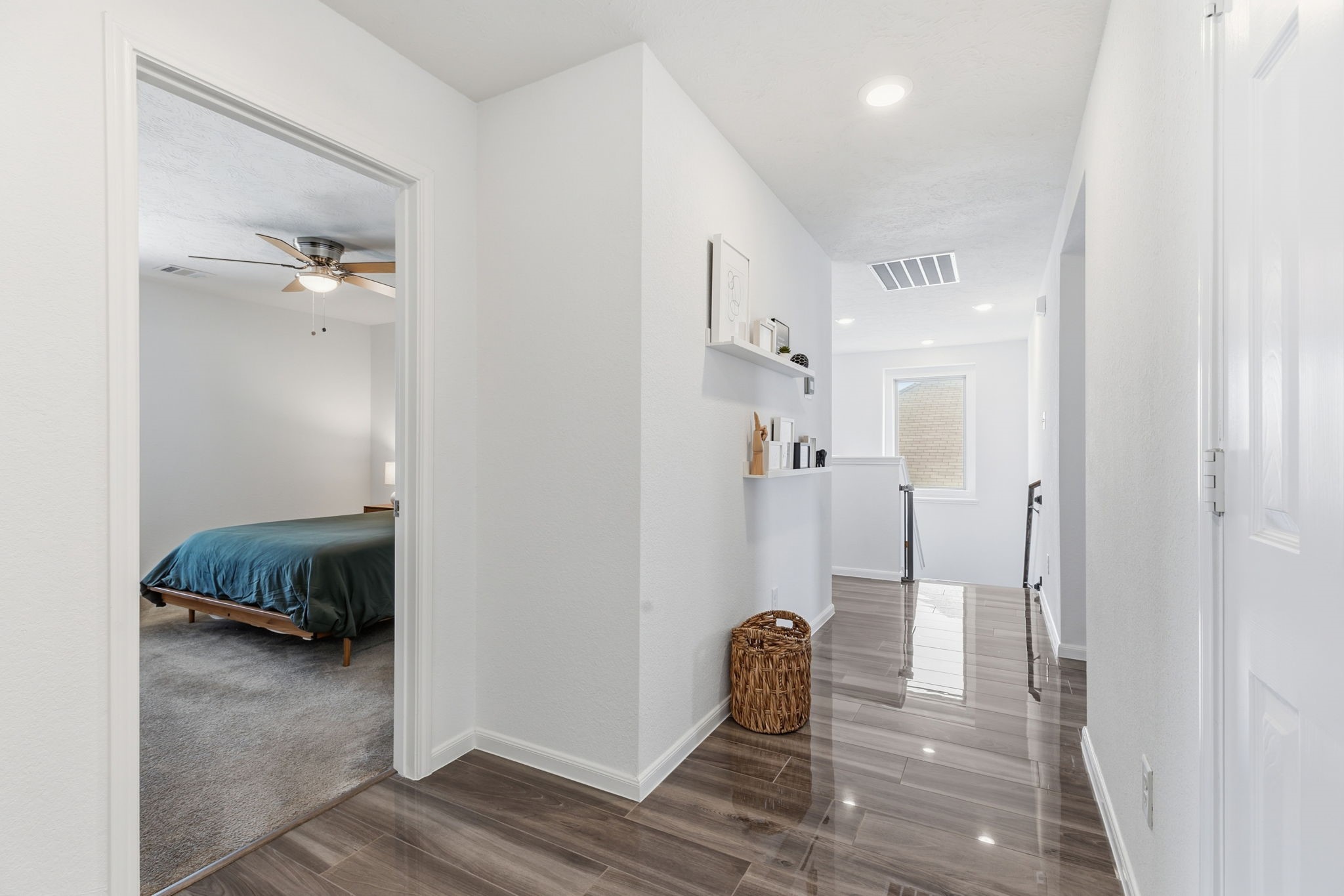 5127 Avondale Rise Street Katy, TX 77493 - Photo 38 of 47 a view of a bedroom with wooden floor and bathroom