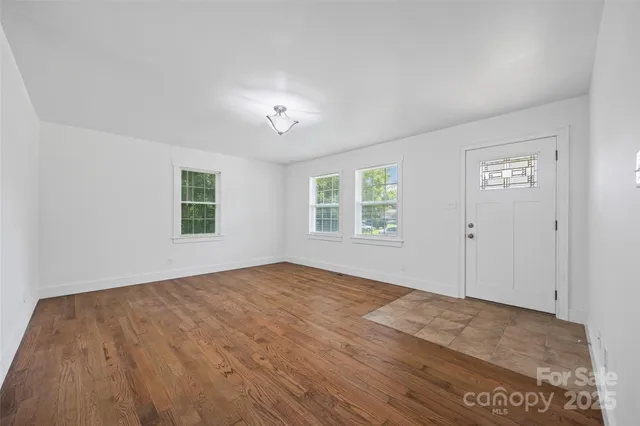 an empty room with windows