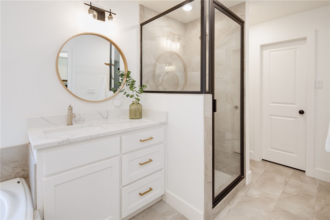 4700 Kensington Road Bryan, TX 77802 - Photo 15 of 31 Primary bathroom features 2 single vanities