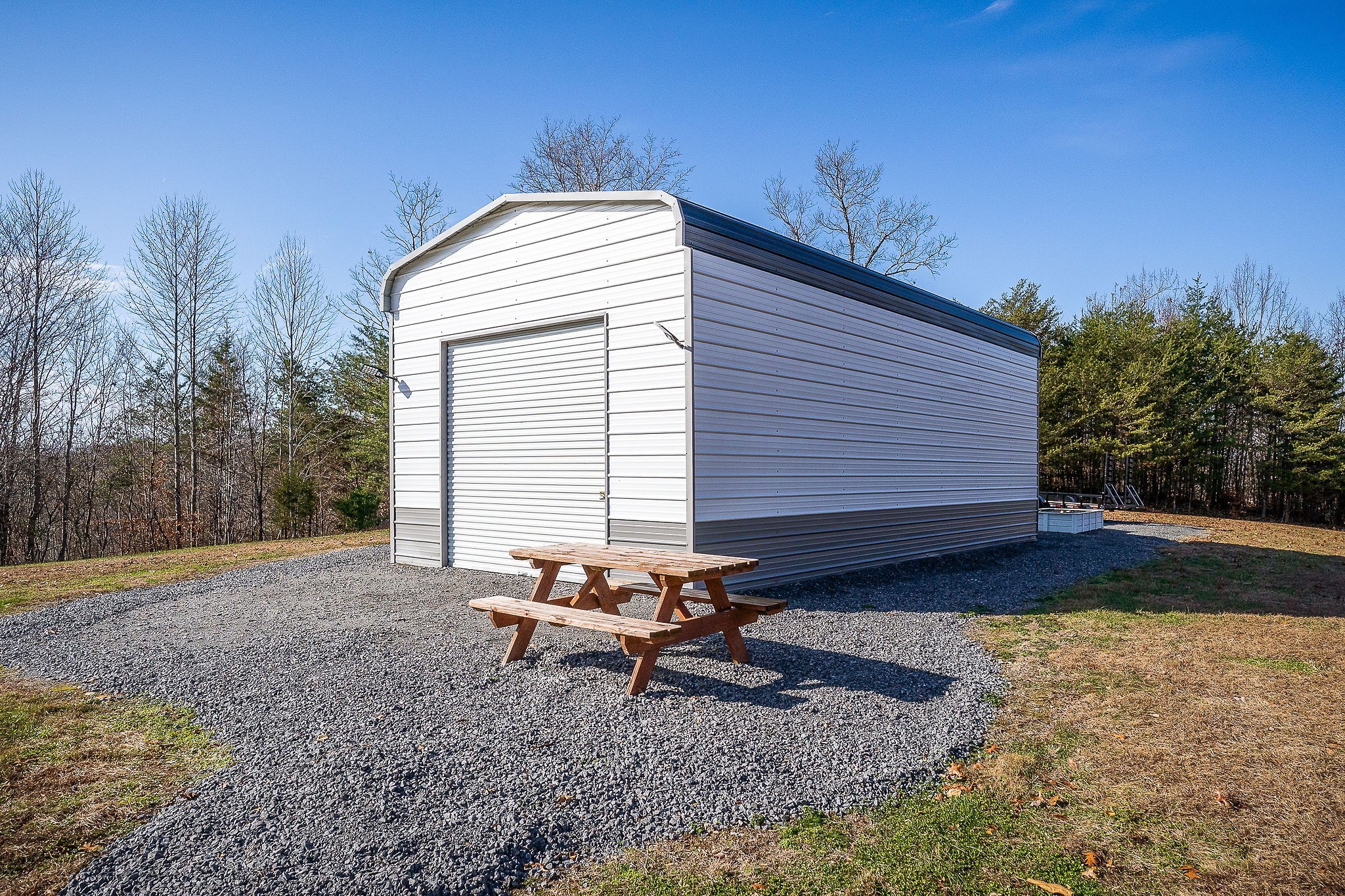 1772 South Fork Road Whitleyville, TN 38588 - Photo 33 of 38 a backyard of a house with table and chairs
