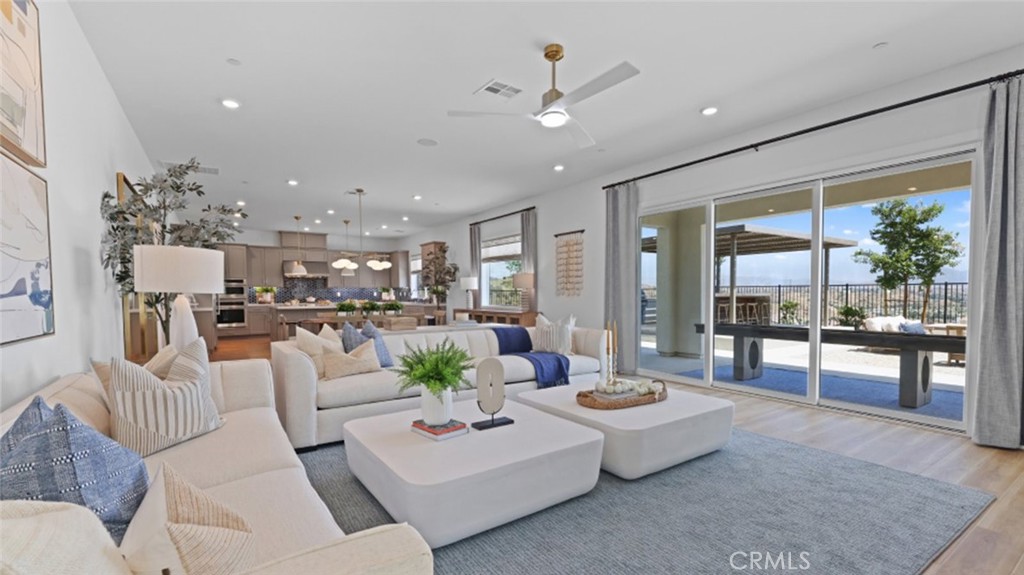29602 Paseo Tranquilo Valencia, CA 91354 - Photo 11 of 43 a living room with furniture and a large window