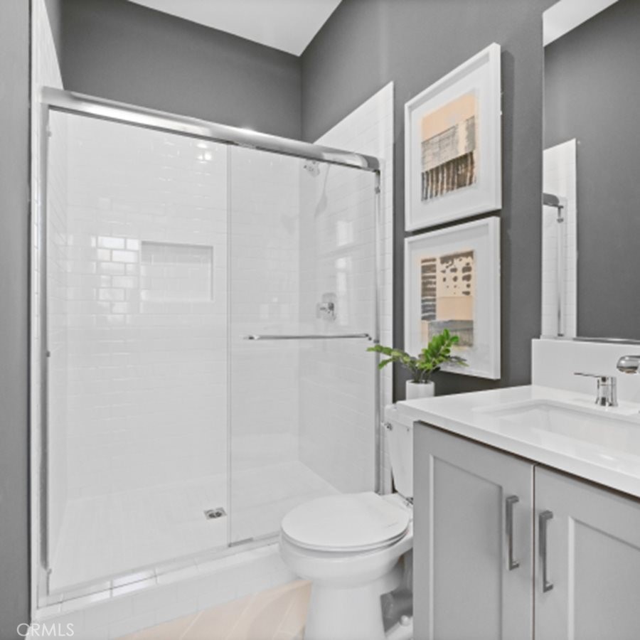 29602 Paseo Tranquilo Valencia, CA 91354 - Photo 18 of 43 a bathroom with a sink toilet and shower