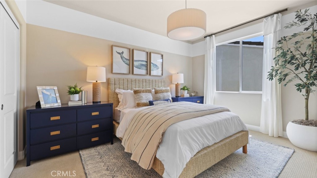 29602 Paseo Tranquilo Valencia, CA 91354 - Photo 30 of 43 a bedroom with a bed and a window