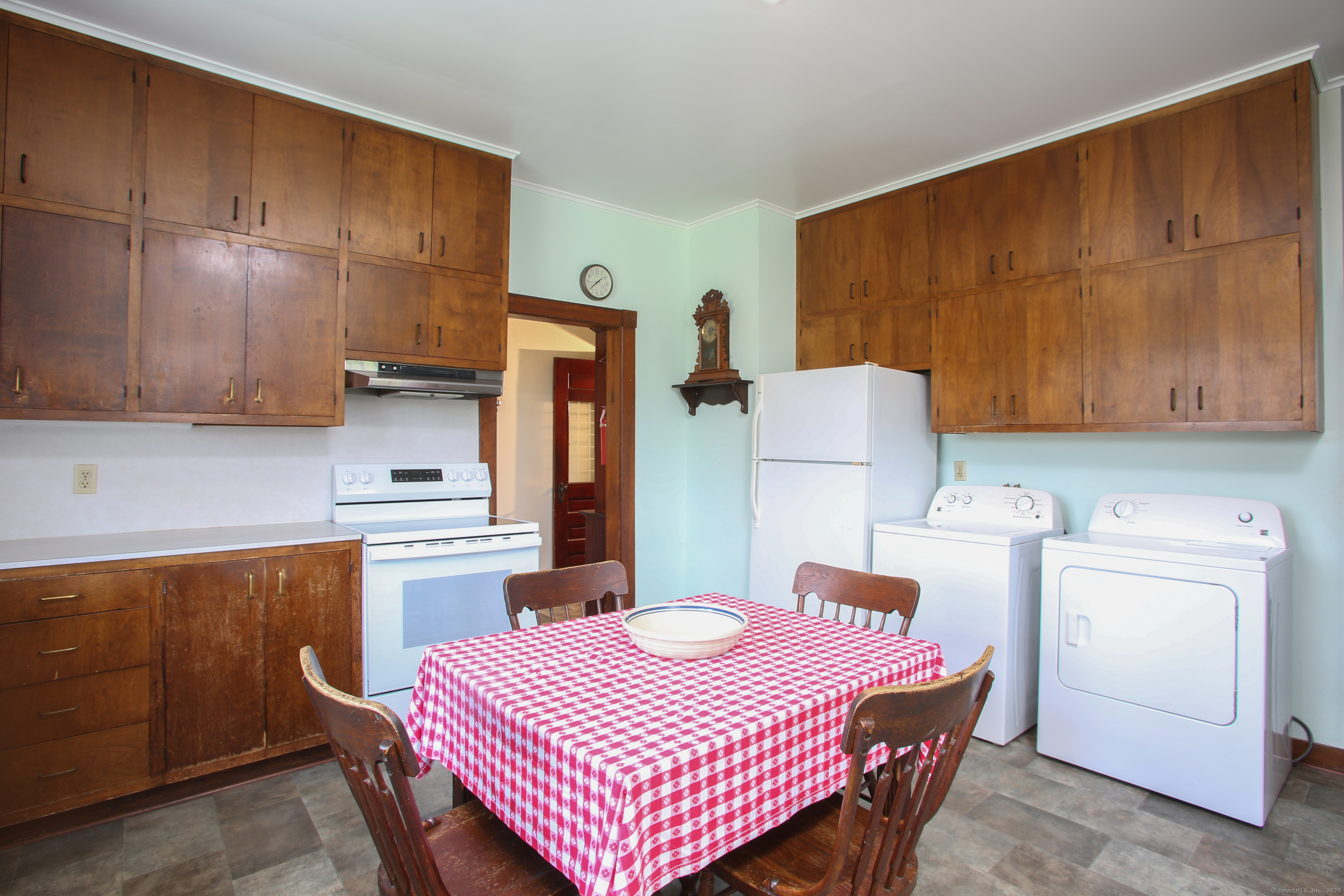 31 Sunset Ridge Road Norfolk, CT 06058 - Photo 11 of 33 a kitchen with a appliances a refrigerator and a stove top oven