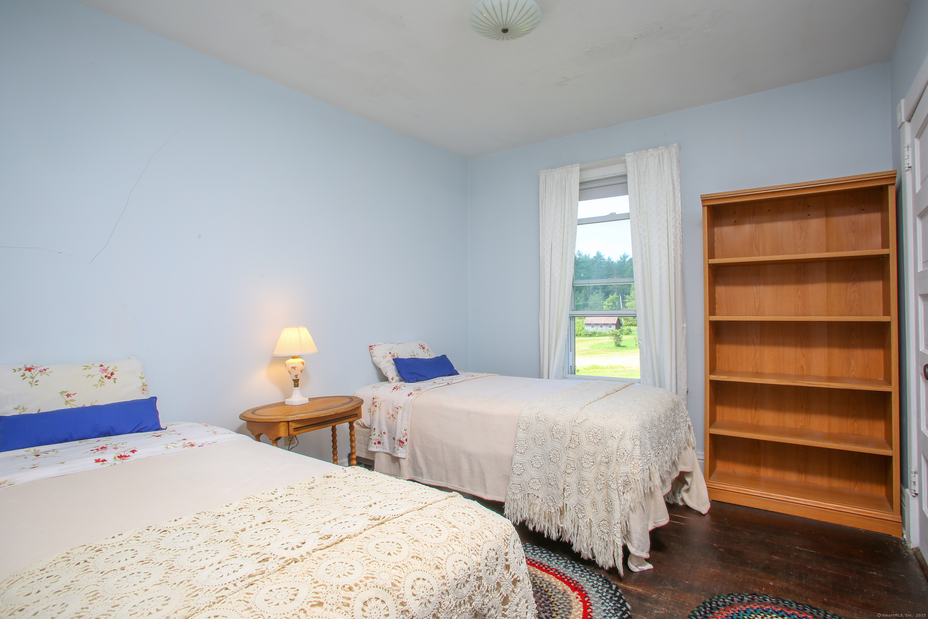 31 Sunset Ridge Road Norfolk, CT 06058 - Photo 14 of 33 a bedroom with two beds and a window