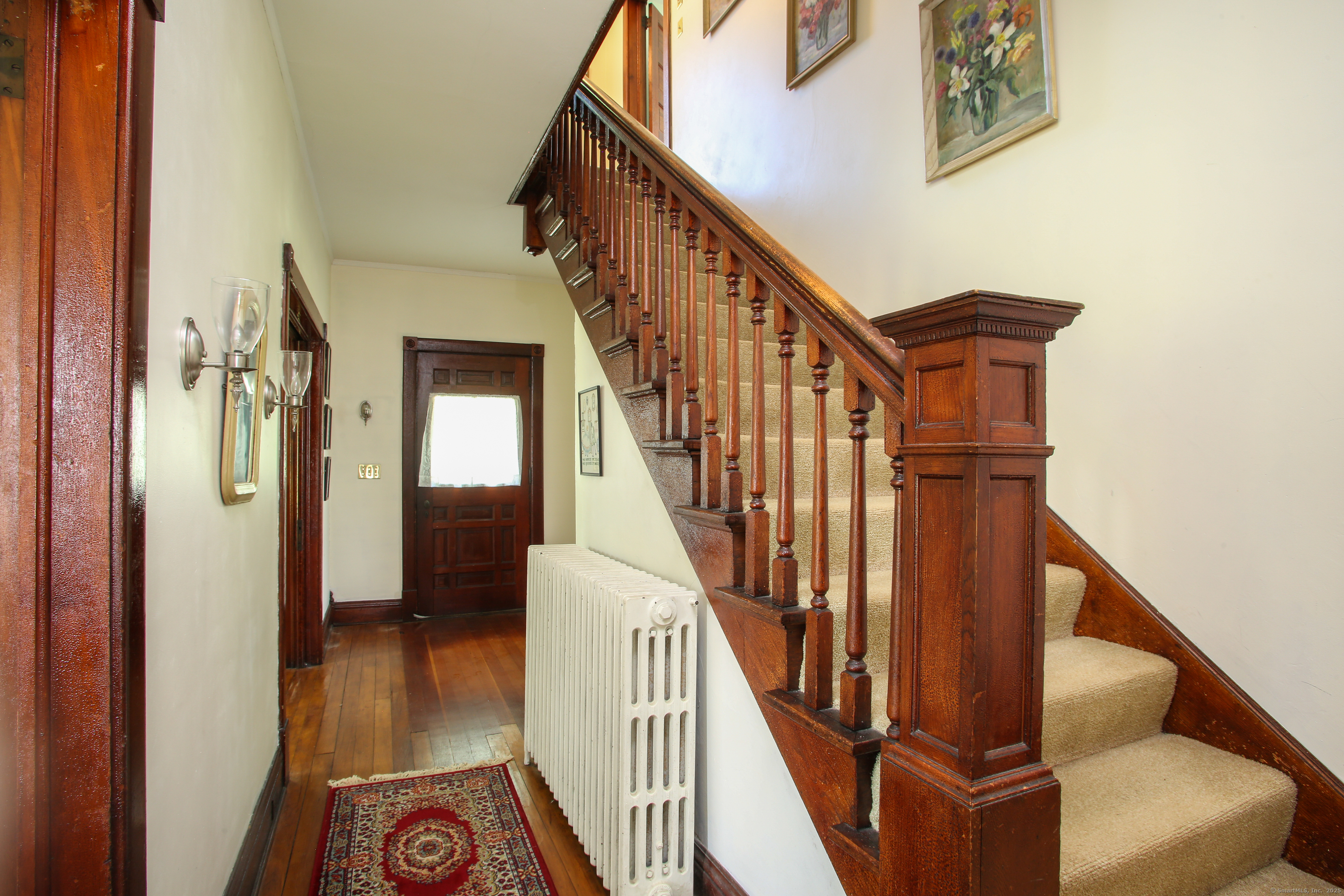 31 Sunset Ridge Road Norfolk, CT 06058 - Photo 6 of 33 a view of entryway and hall with wooden floor