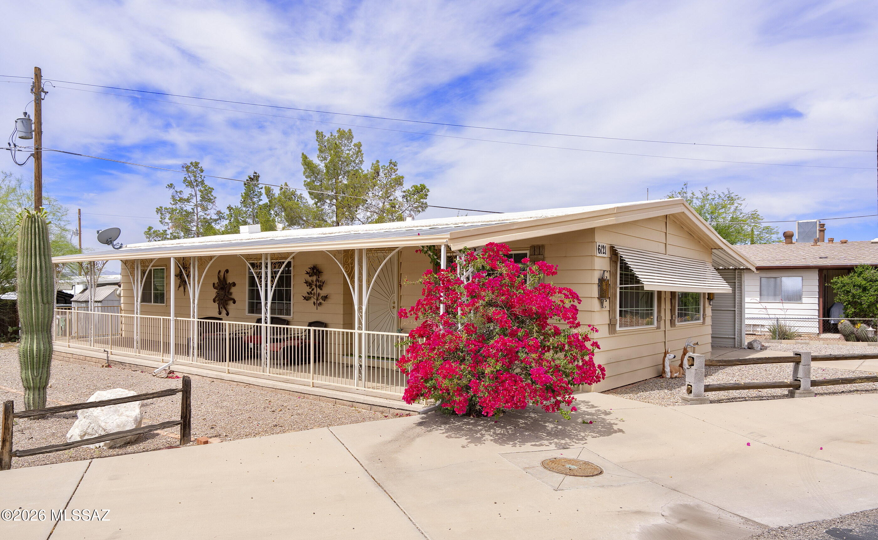6121 West Flying M Street Tucson, AZ 85713 - Photo 19 of 25 front view of house with a street
