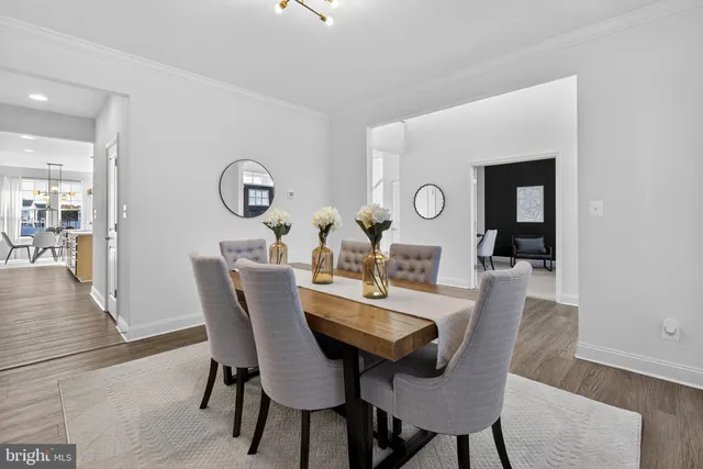 a bedroom with furniture and a lamp