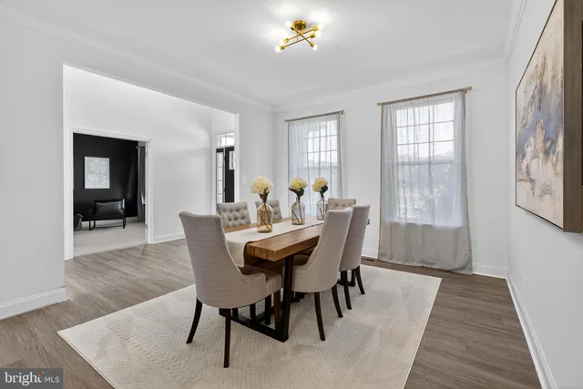 a bathroom with a double sink shower and a mirror