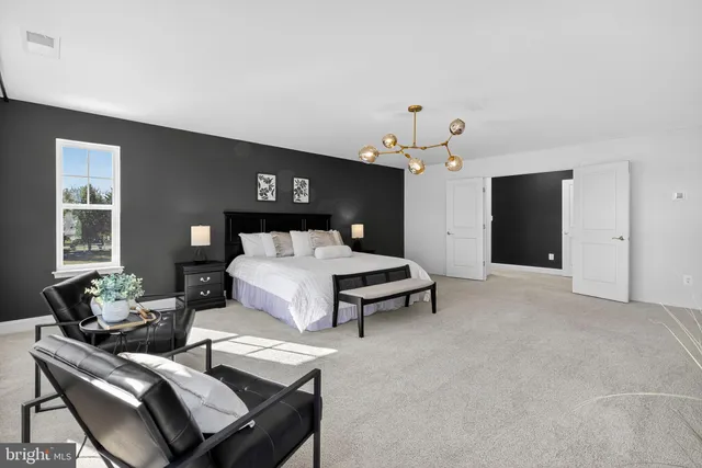 a white toilet sitting next to a window