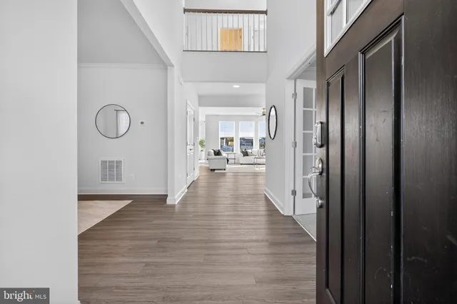 a large kitchen with stainless steel appliances kitchen island granite countertop a large counter top and stove