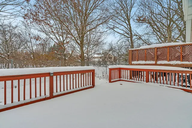 a view of a wooden roof deck