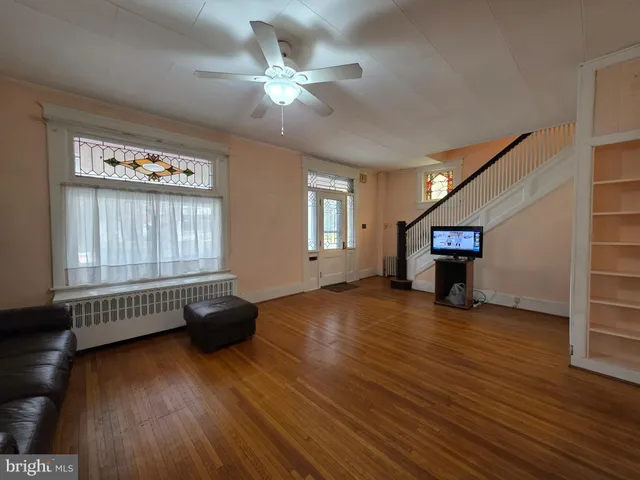 a view of livingroom with hardwood floor and window