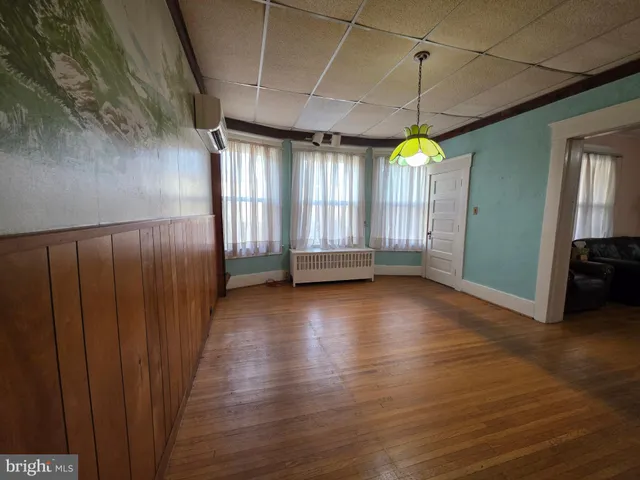a kitchen with stainless steel appliances granite countertop a stove sink and cabinets