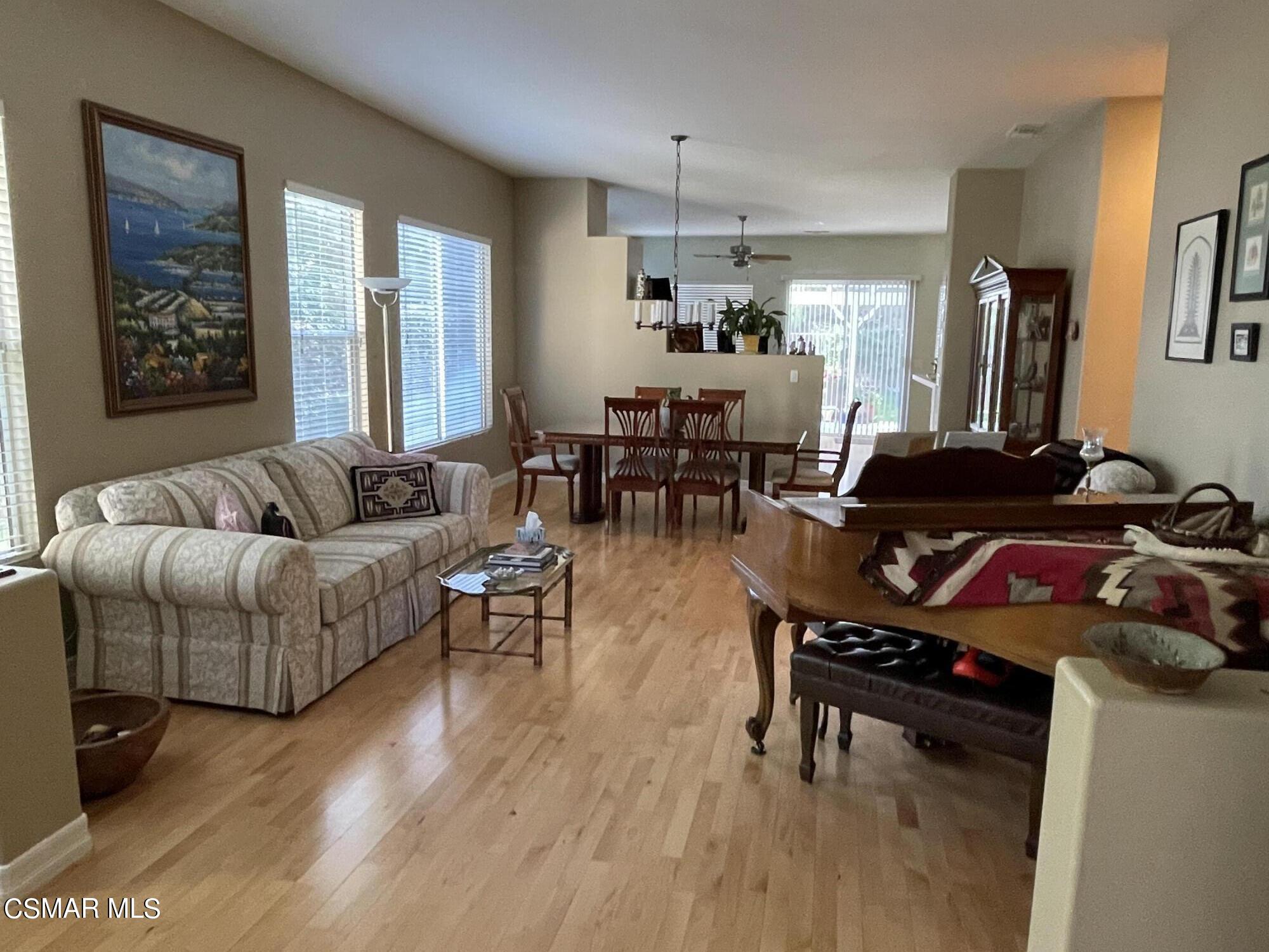 28587 Haskell Canyon Road Saugus, CA 91390 - Photo 12 of 26 a living room with furniture and wooden floor
