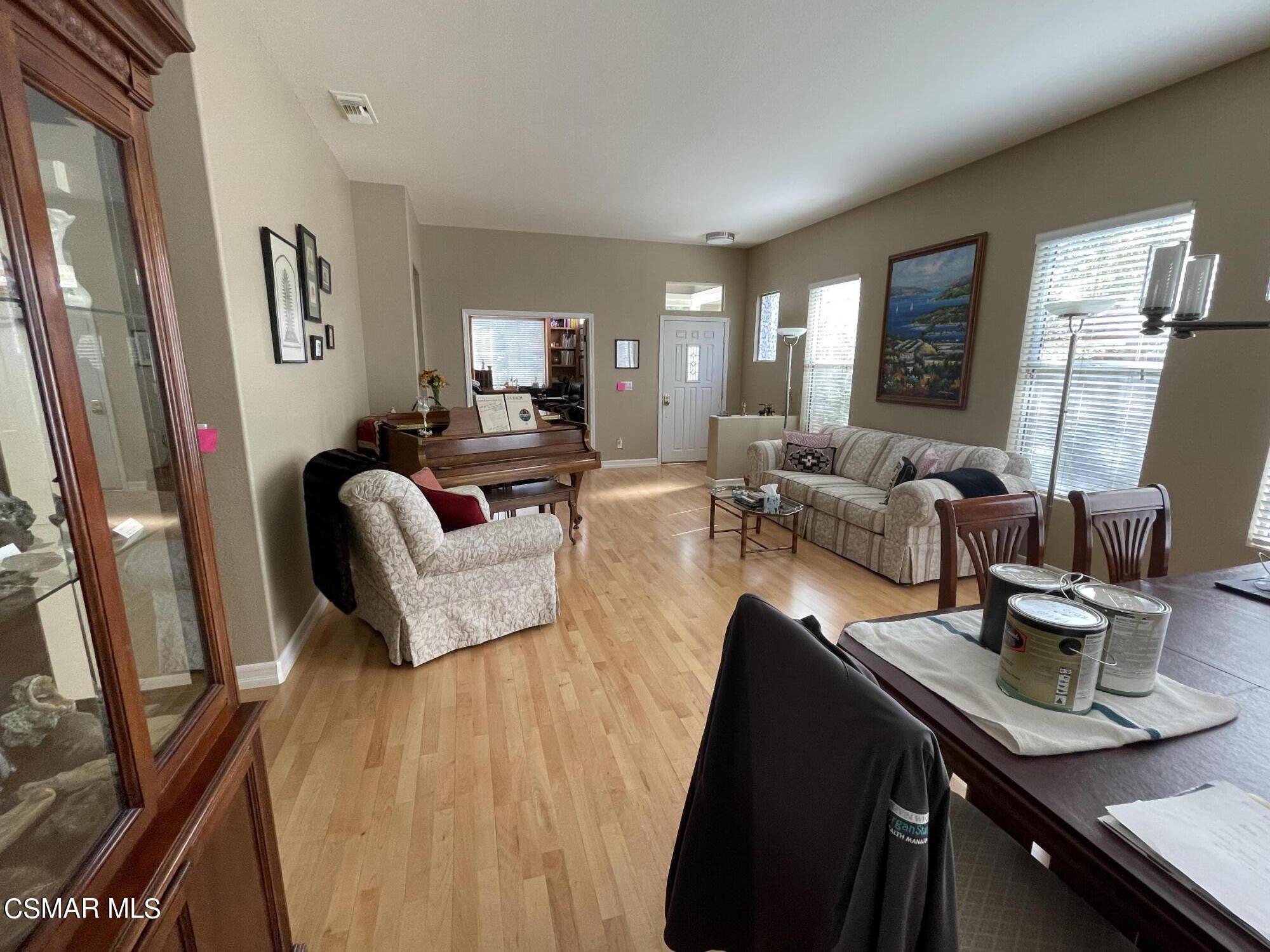 28587 Haskell Canyon Road Saugus, CA 91390 - Photo 10 of 26 a living room with furniture and a flat screen tv