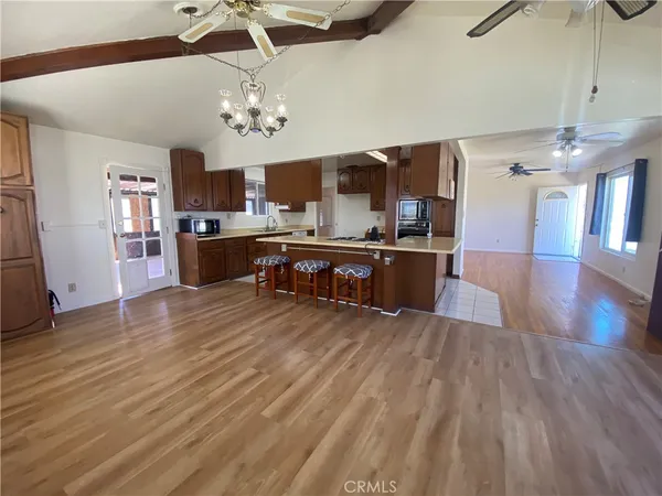 a view of a kitchen and dining room