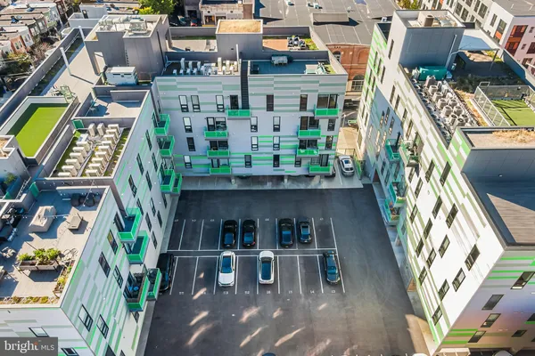 aerial view of multiple houses with outdoor space