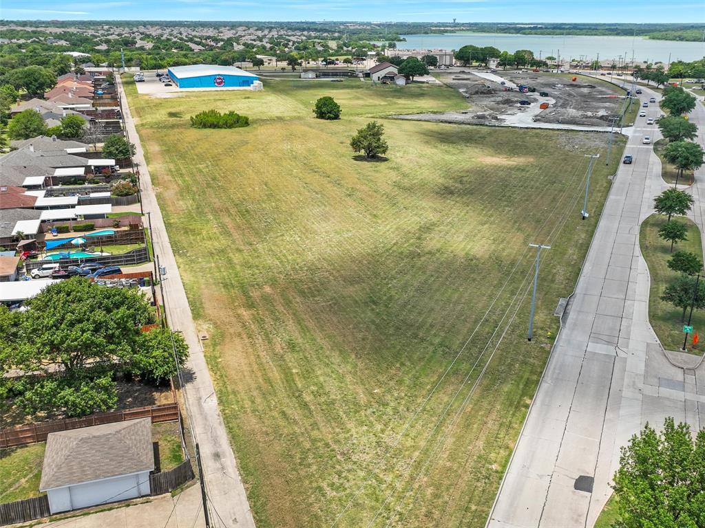 3401 Roan Road Garland, TX 75043 - Photo 7 of 19 an aerial view of residential houses with outdoor space