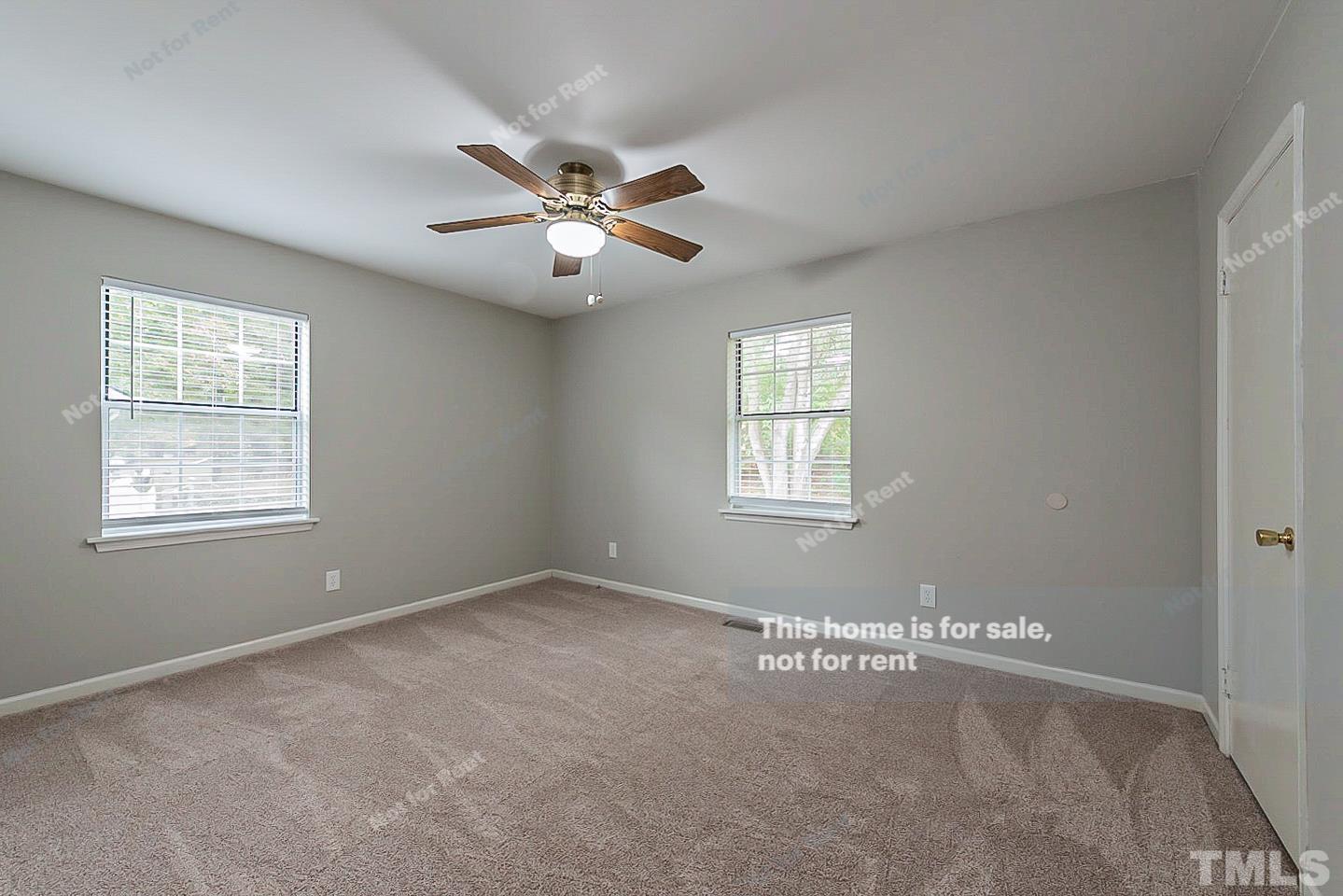917 Horton Road Durham, NC 27704 - Photo 12 of 17 a view of an empty room with a window