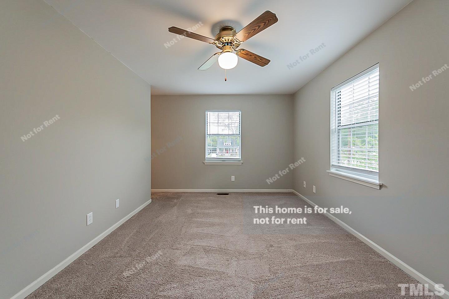 917 Horton Road Durham, NC 27704 - Photo 10 of 17 a view of an empty room with a window