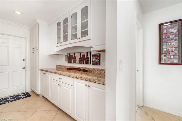 a kitchen with stainless steel appliances granite countertop a sink and dishwasher
