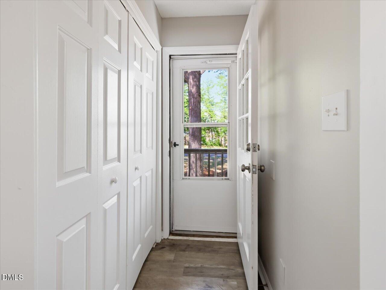 5 Jenee Lane Durham, NC 27703 - Photo 25 of 60 a view of a hallway with a door and front door