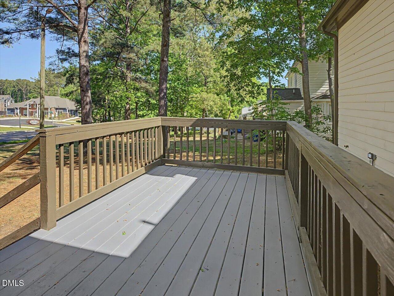 5 Jenee Lane Durham, NC 27703 - Photo 26 of 60 a view of balcony with wooden floor