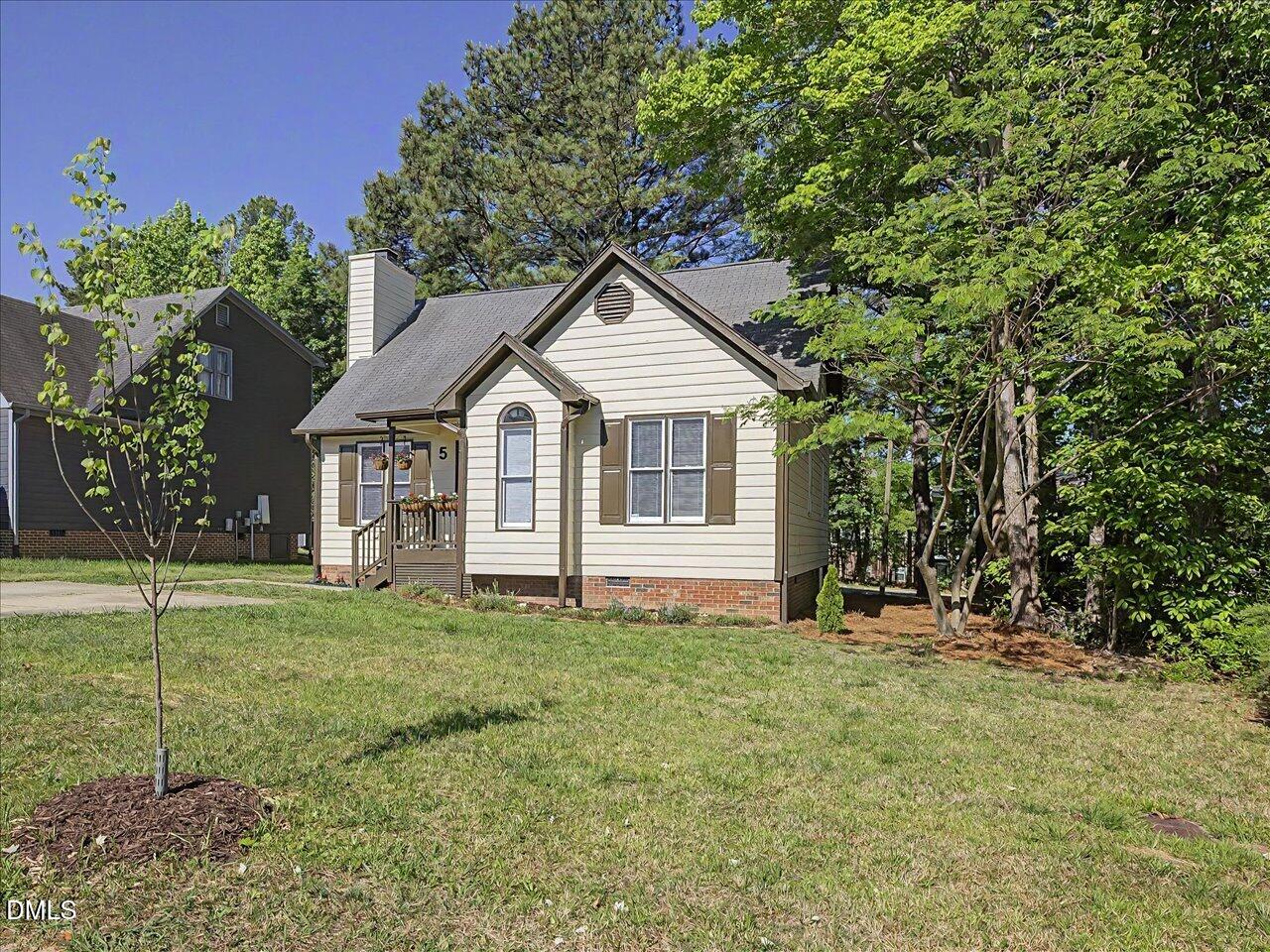5 Jenee Lane Durham, NC 27703 - Photo 2 of 60 a front view of a house with a yard