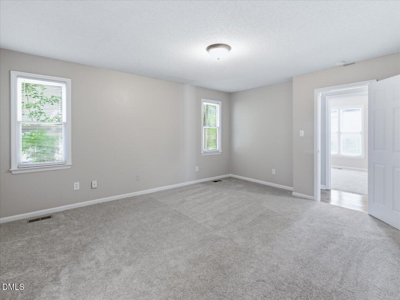 5 Jenee Lane Durham, NC 27703 - Photo 35 of 60 a view of an empty room with a window