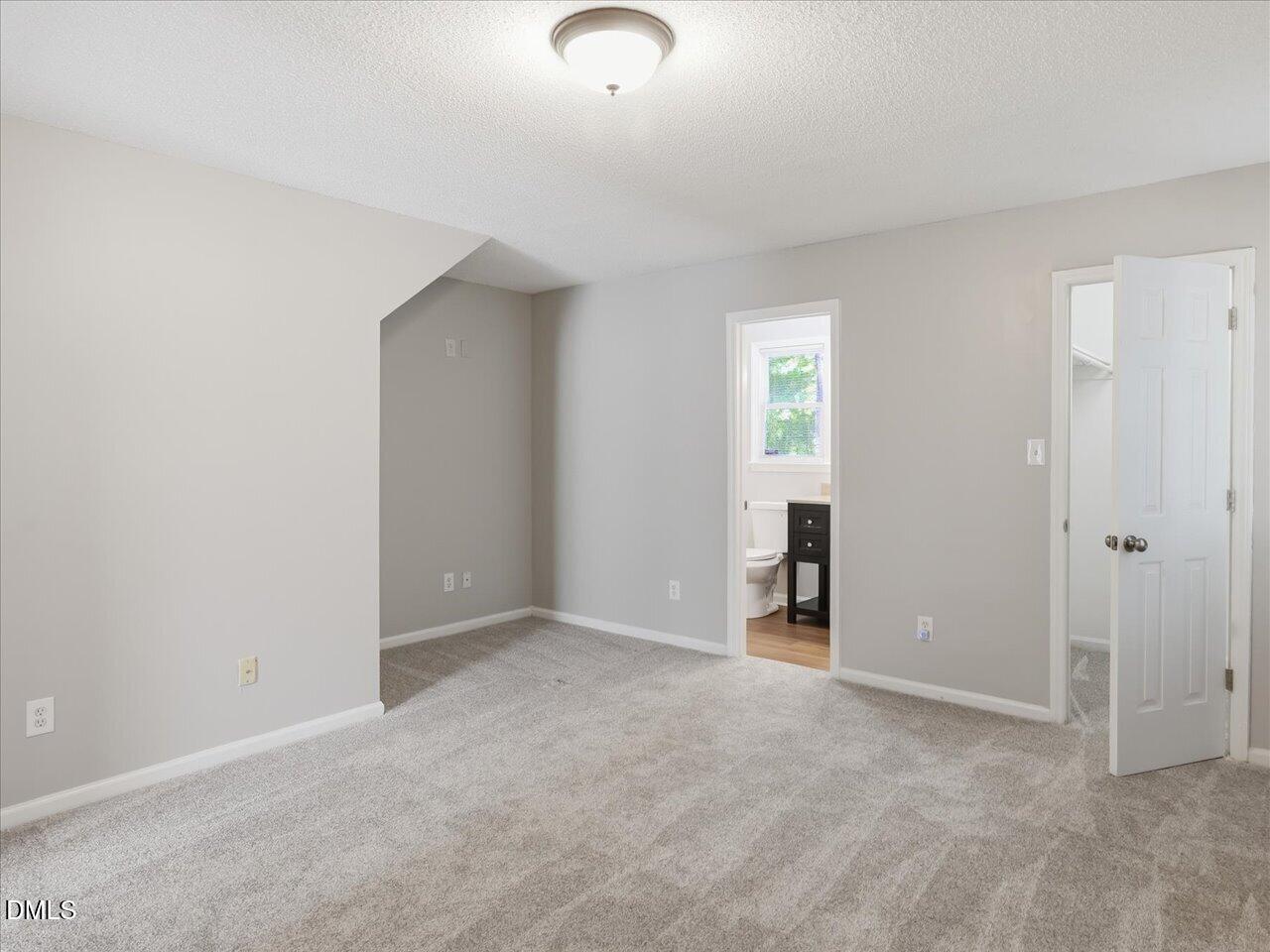 5 Jenee Lane Durham, NC 27703 - Photo 36 of 60 an empty room with an entryway