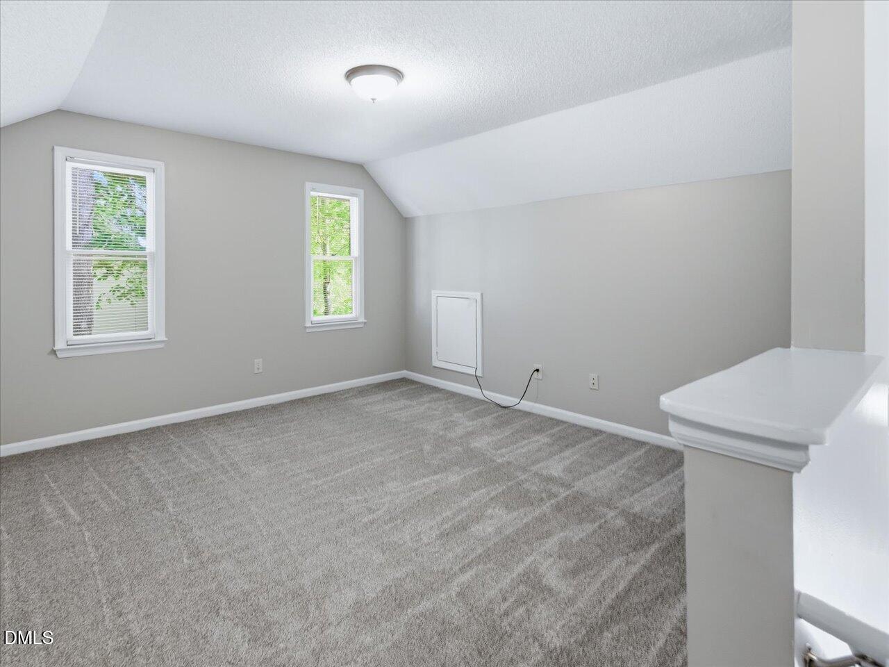 5 Jenee Lane Durham, NC 27703 - Photo 48 of 60 an empty room with windows