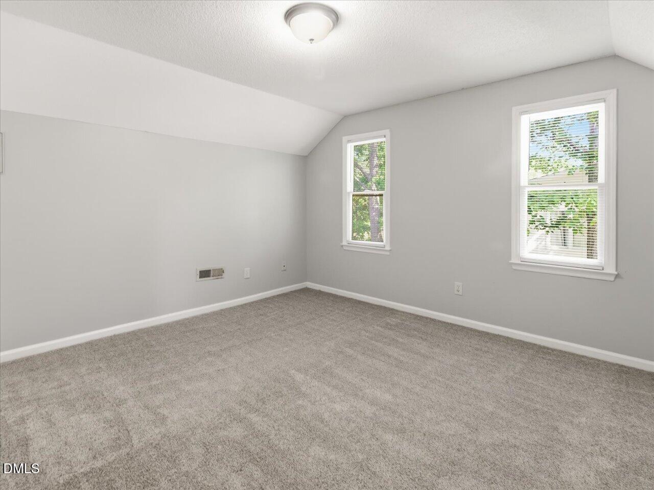 5 Jenee Lane Durham, NC 27703 - Photo 51 of 60 an empty room with windows