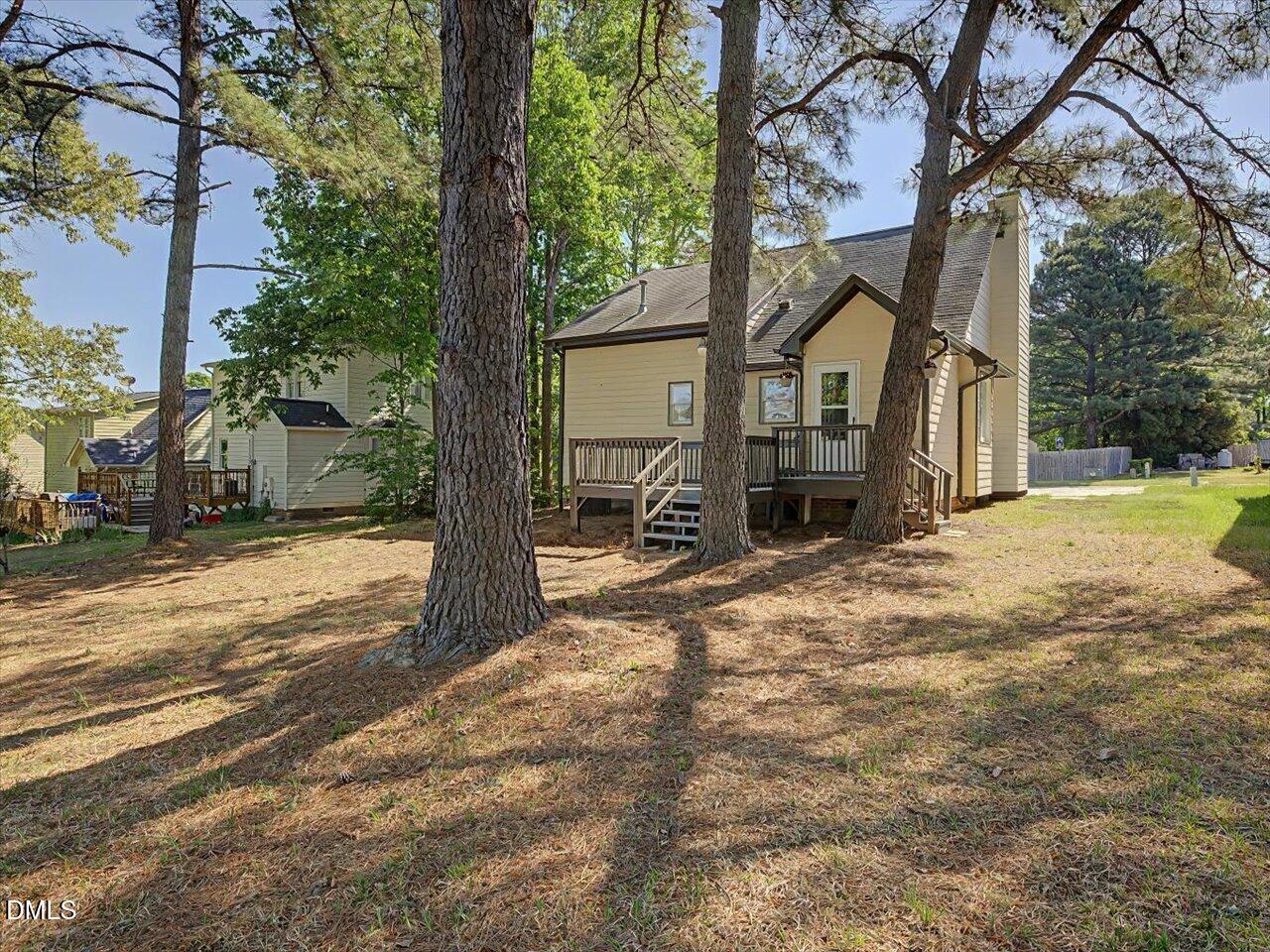 5 Jenee Lane Durham, NC 27703 - Photo 56 of 60 a view of a house with a yard