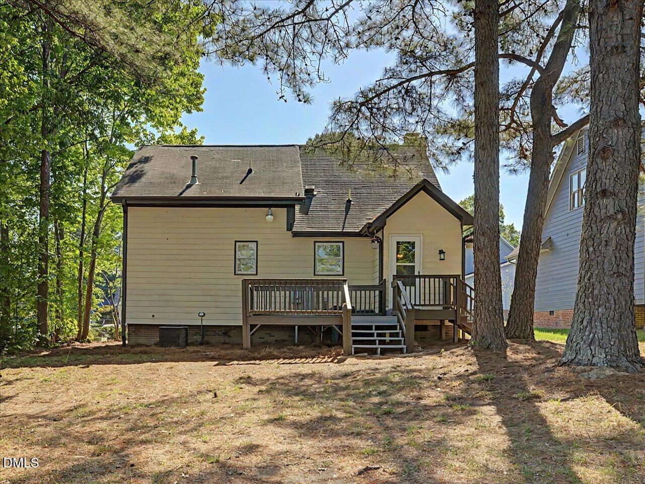 5 Jenee Lane Durham, NC 27703 - Photo 57 of 60 a view of a house with a yard