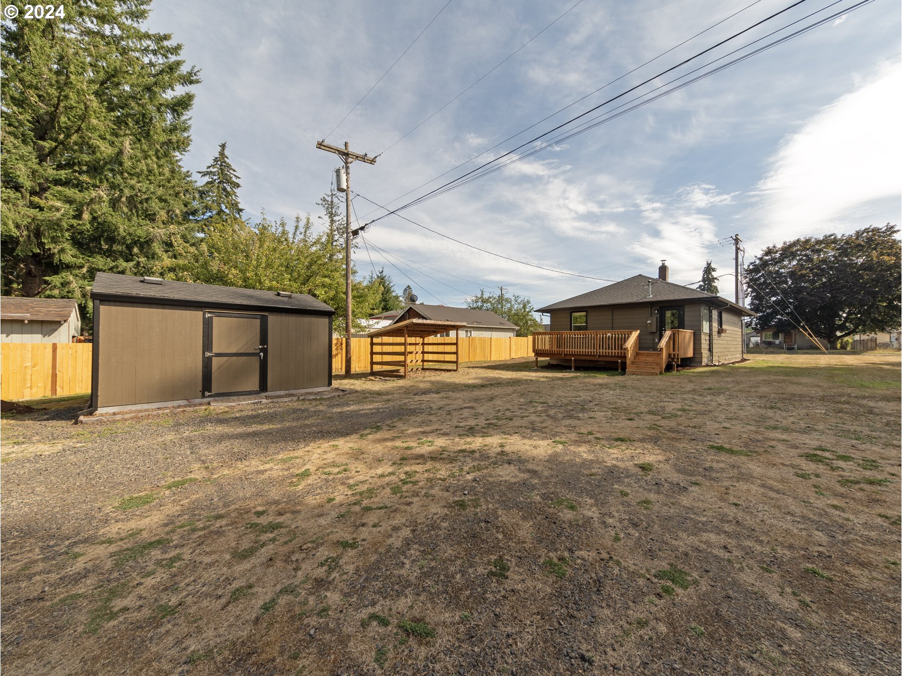 654 East Bridge Street Vernonia, OR 97064 - Photo 25 of 28 a front view of a house with a yard and garage
