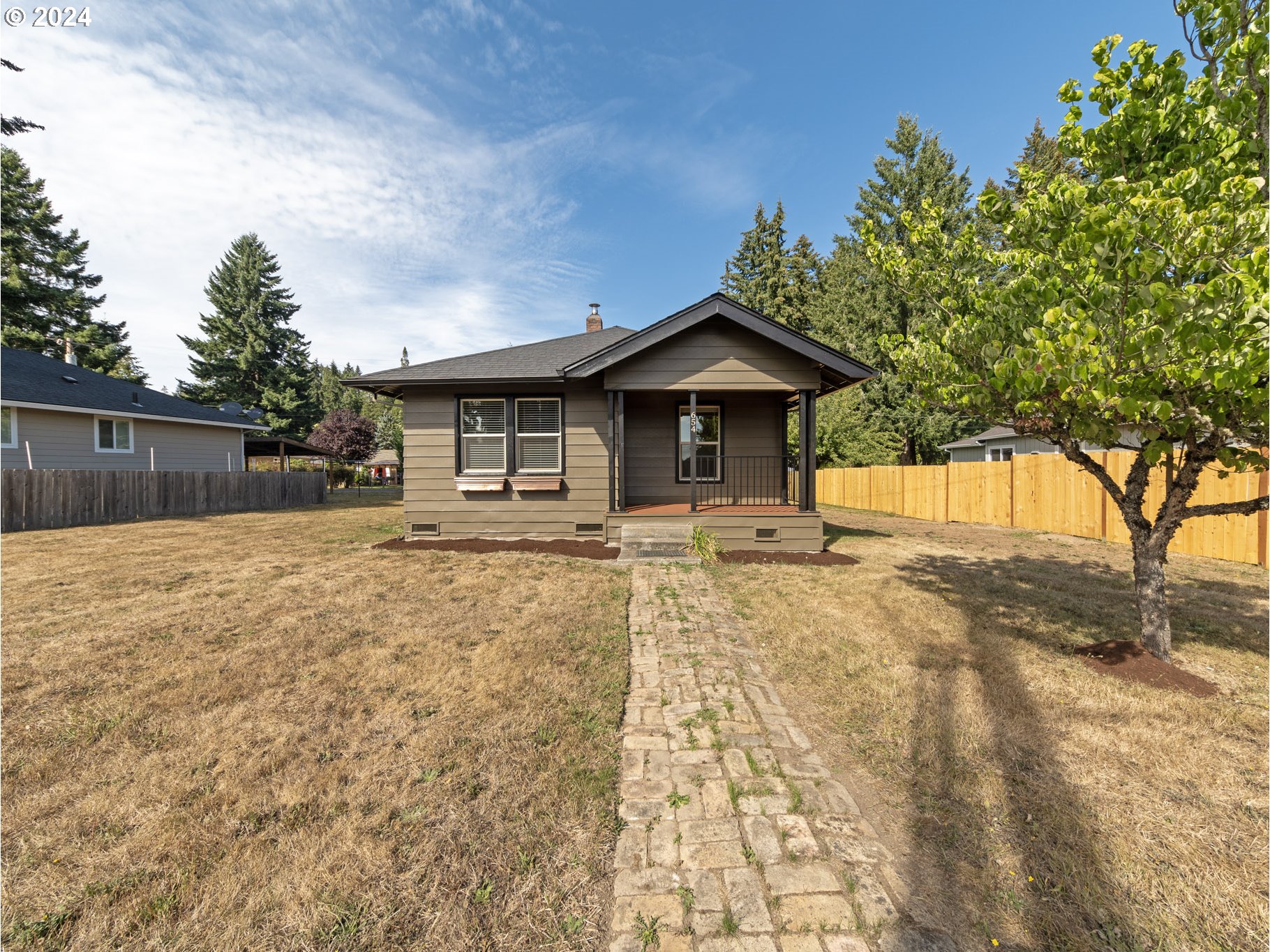 654 East Bridge Street Vernonia, OR 97064 - Photo 28 of 28 a front view of a house with a yard