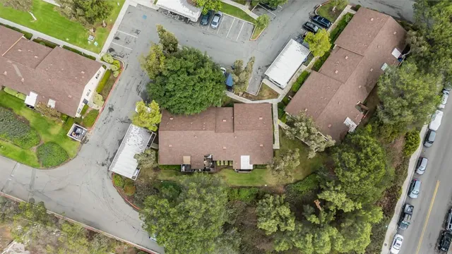 an aerial view of a house with a garden