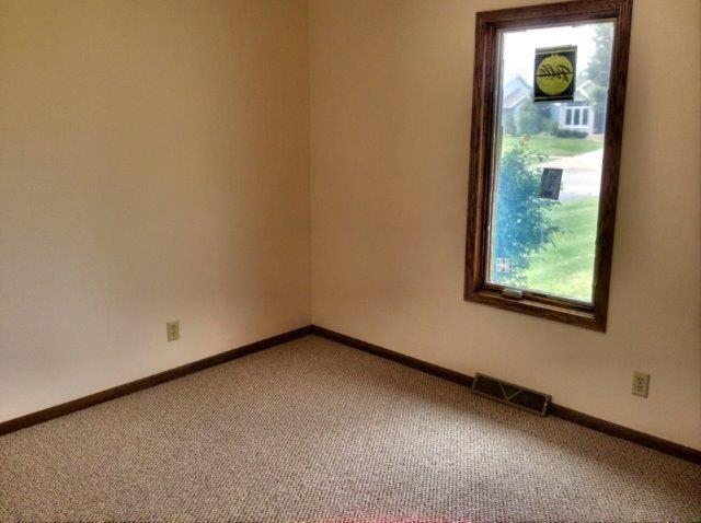 992 South Trainer Road Rockford, IL 61108 - Photo 11 of 15 a view of an empty room with window