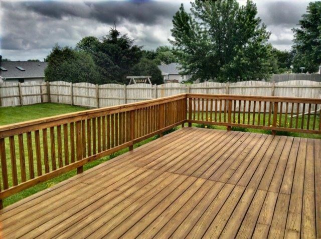 992 South Trainer Road Rockford, IL 61108 - Photo 15 of 15 a view of deck with wooden floor and fence