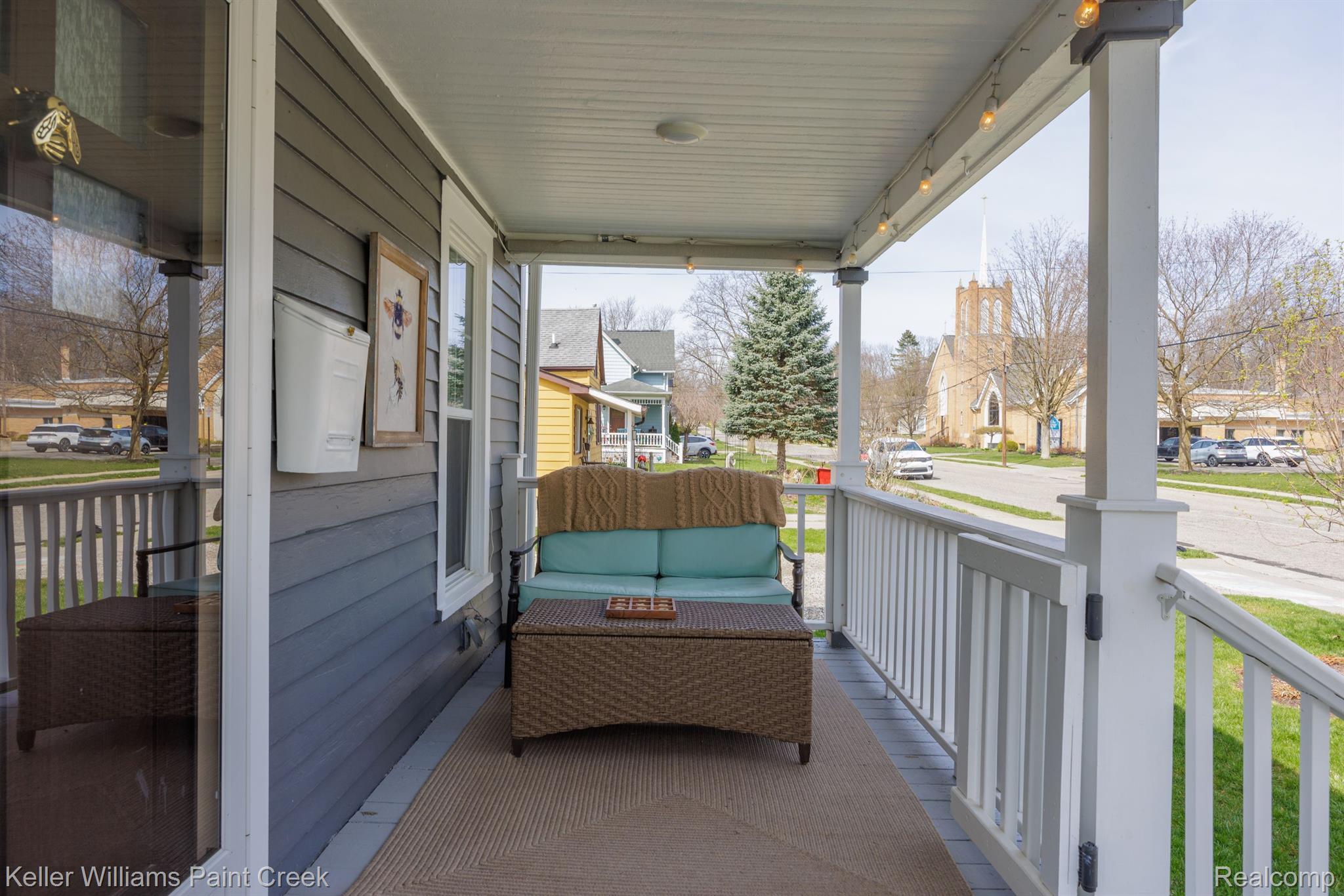 215 Benjamin Street Romeo, MI 48065 - Photo 3 of 46 Cozy Front Porch with baby/pet gate!
